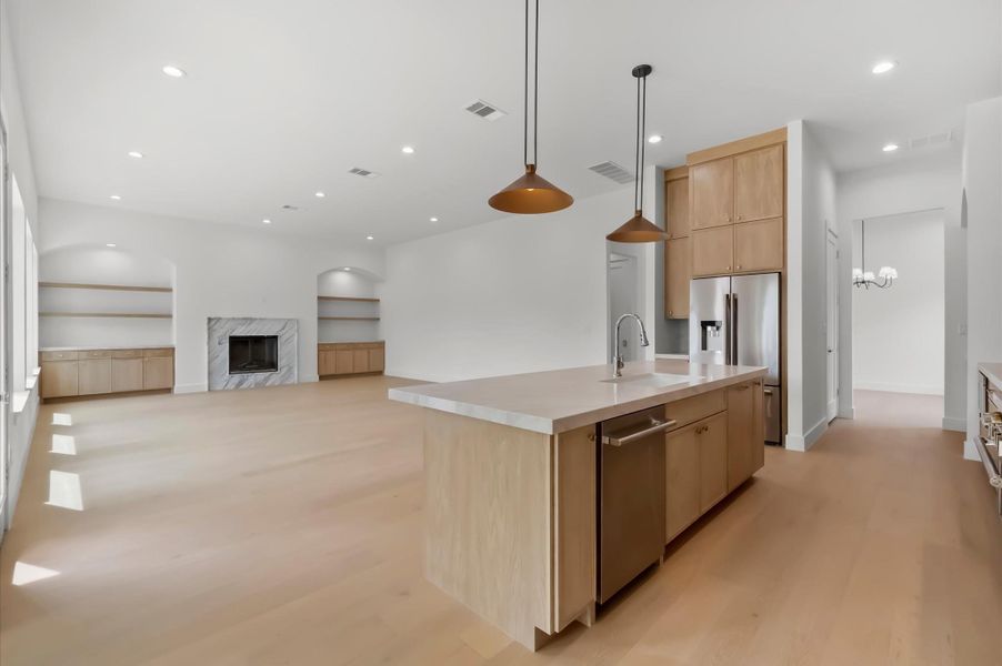 Open-concept kitchen designed for everyday living and entertainment. Open-concept kitchen designed for everyday living and entertainment.