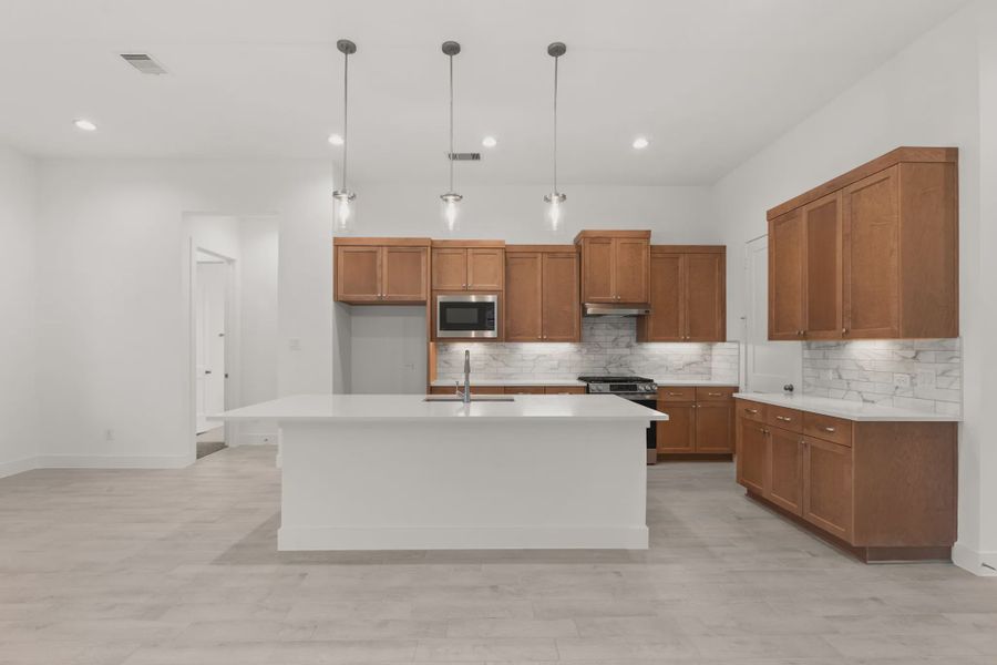 Representative furnished interior of a home built from the Mickelson by Chesmar Homes in Riceland Alley Loads, Mont Belvieu (Image 61).