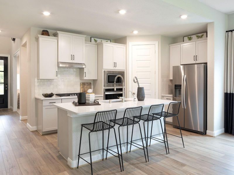 Photo is not of the actual home, but is an inspirational photo of builder’s model home and may depict options, furnishings, and/or decorator features that are not included