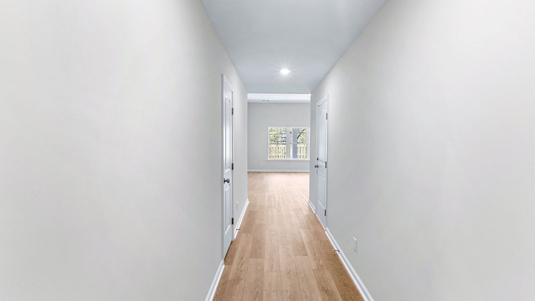 Representative unfurnished interior of a home built from the The Holly by Smith Family Homes in Lakeview Pines, Statesboro (Image 18).