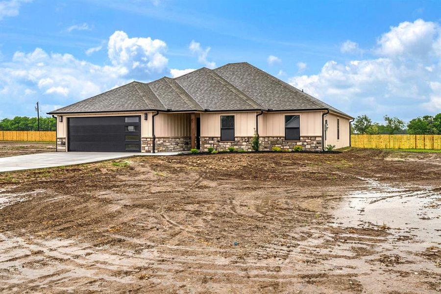 Front exterior of a new home in , Sumner, TX, highlighting curb appeal (Image 18). Front exterior of a new home in , Sumner, TX, highlighting curb appeal (Image 18).