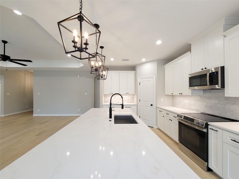 Furnished interior view inside a new home in , Conroe (Image 8).
