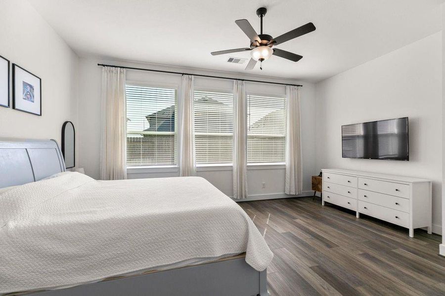 A peek into the Primary Bedroom fromthe luxurious en suite bathroom. A peek into the Primary Bedroom fromthe luxurious en suite bathroom.
