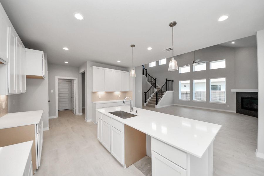 The extended counter area adds both practicality and style, making meal preparation a breeze. Every detail is thoughtfully designed to enhance the kitchen's functionality and aesthetic appeal.