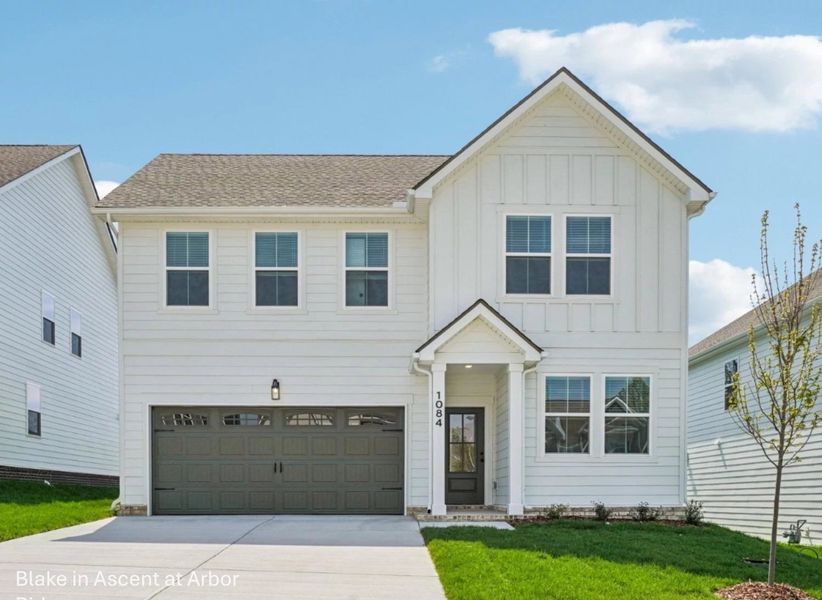 Front exterior of a new home in Ascent at Arbor Ridge, La Vergne, TN, highlighting curb appeal (Image 1). Front exterior of a new home in Ascent at Arbor Ridge, La Vergne, TN, highlighting curb appeal (Image 1).