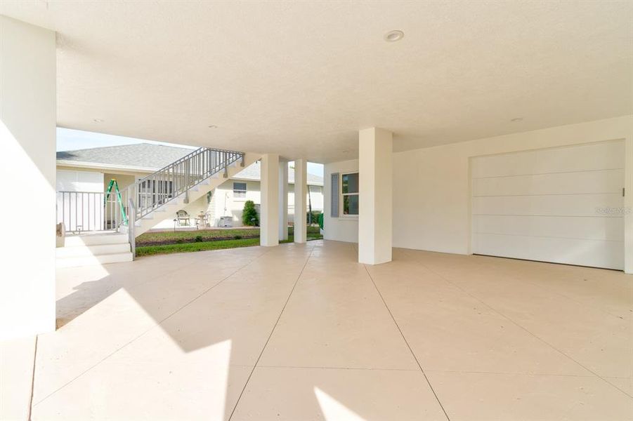 Exterior details and patio area of a home in , New Smyrna Beach (Image 28).