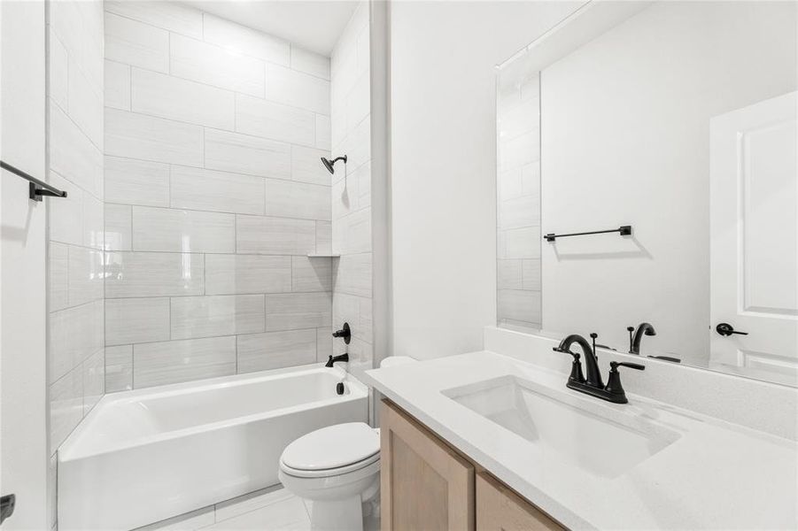 Furnished interior view inside a new home in Painted Tree Woodland District 50, McKinney (Image 4).