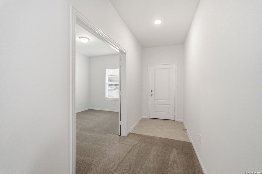 Spacious, unfurnished interior of a new home in Hennersby Hollow, San Antonio (Image 15).