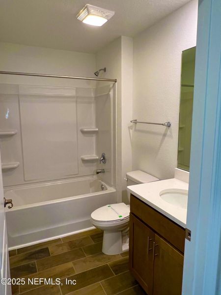 Furnished interior view inside a new home in American Village, Palm Coast (Image 8).