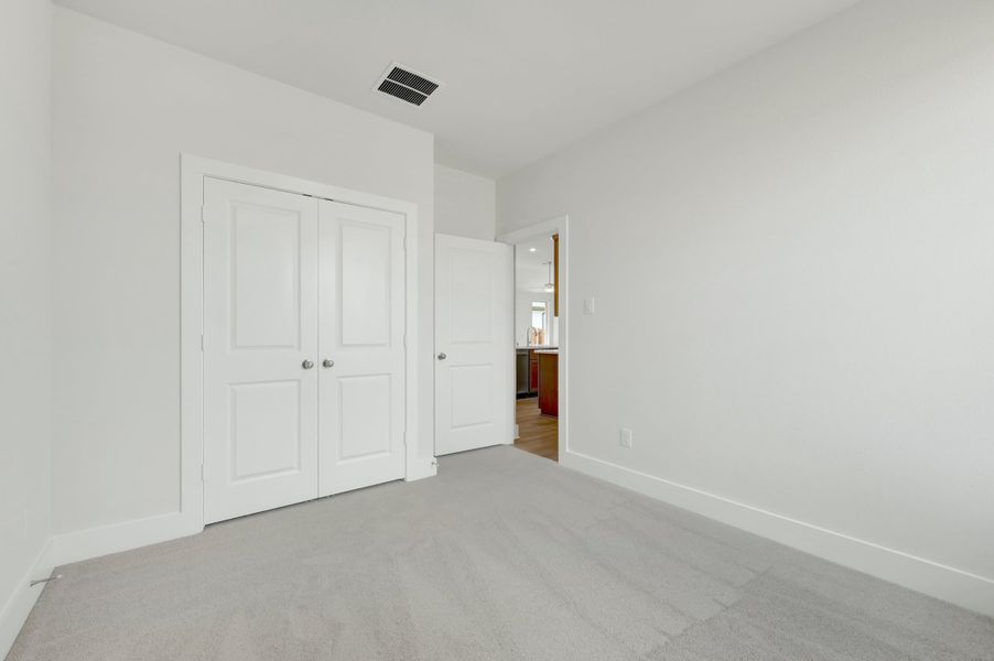 Spacious, unfurnished interior of a new home in The Meadows, Denton (Image 20).