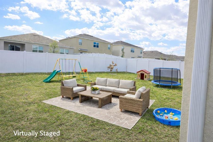 Exterior details and patio area of a home in Wind Meadows South, Bartow (Image 28).