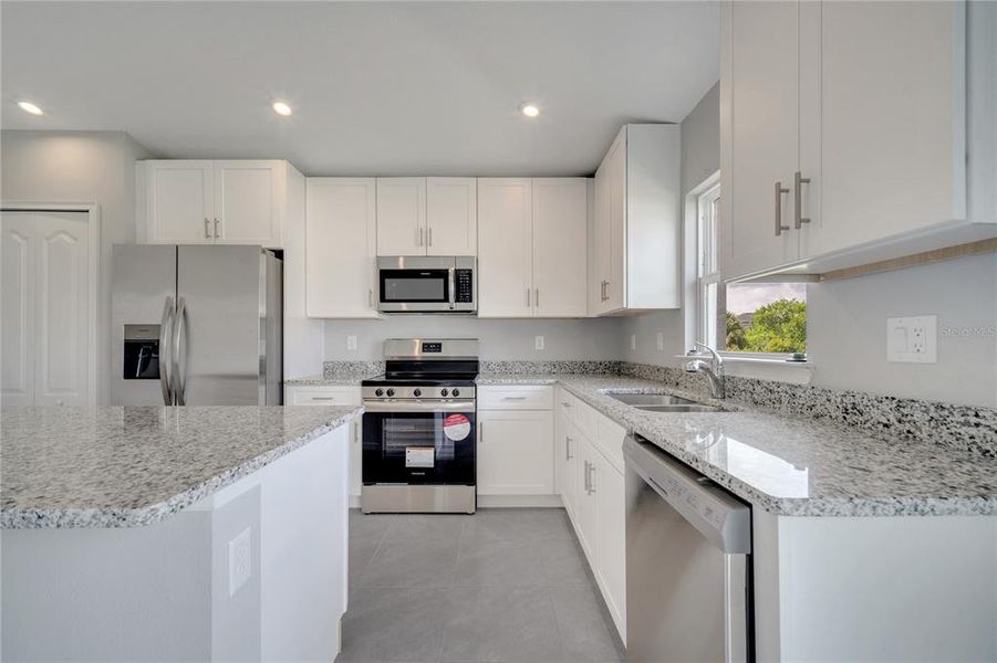 Furnished interior view inside a new home in , Kissimmee (Image 9).