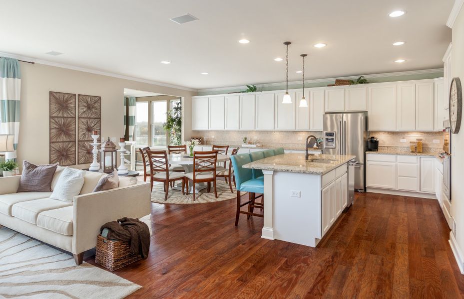 Bright Open Kitchen with Large Island and Café