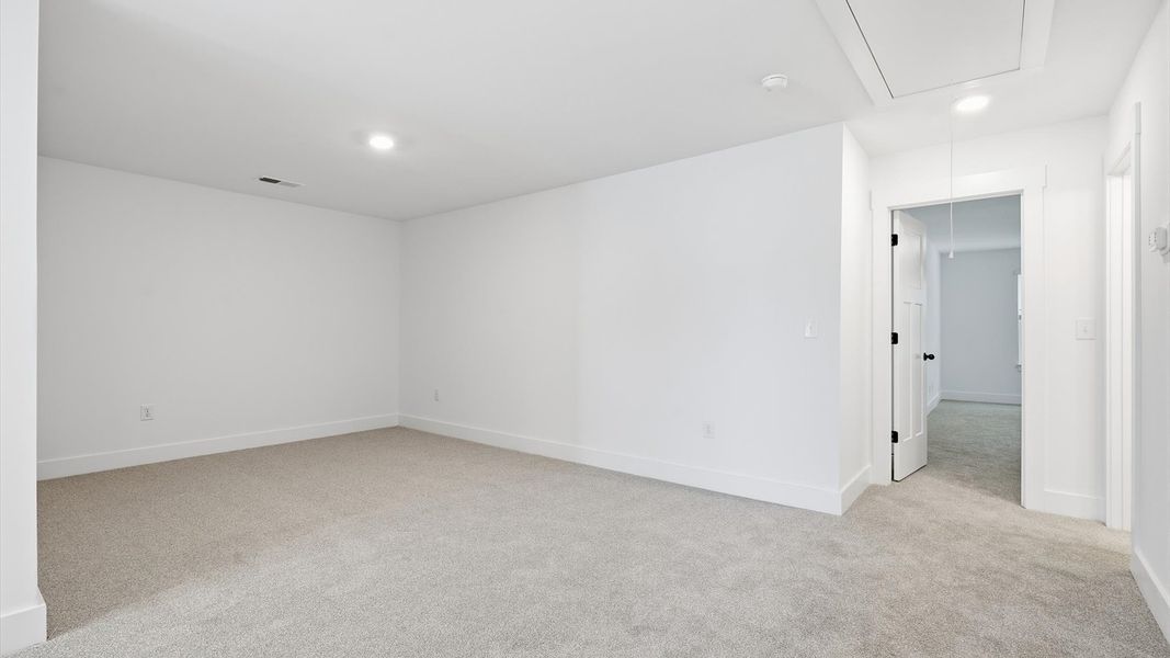 Vibrant carpeted loft offering flexibility as a study nook, game room, or second family space near Lake Hartwell Vibrant carpeted loft offering flexibility as a study nook, game room, or second family space near Lake Hartwell