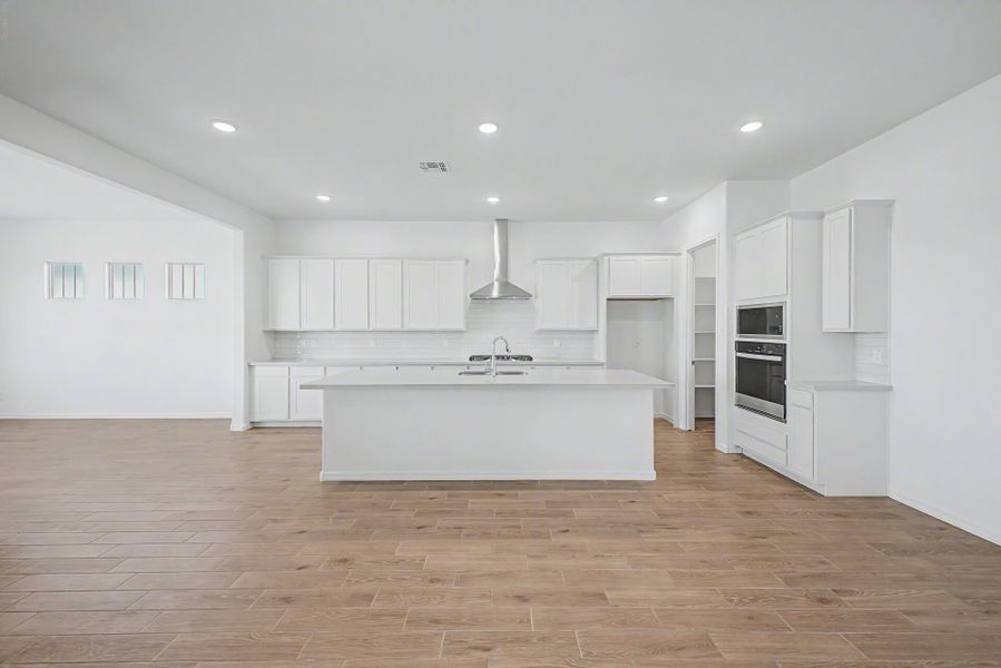 Spacious, unfurnished interior of a new home in Empire Pointe, Queen Creek (Image 8).