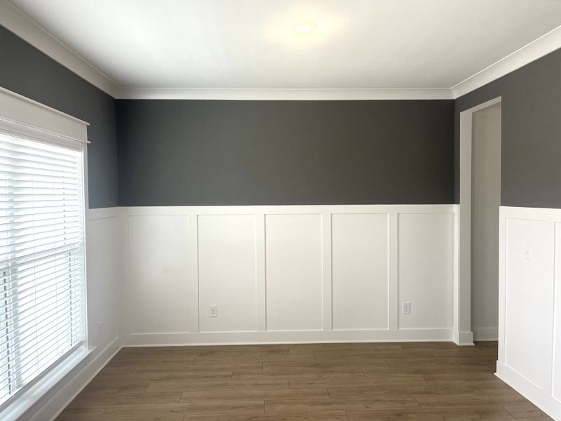 Beautiful, formal dining room at the entrance with extra craftsman trim work.