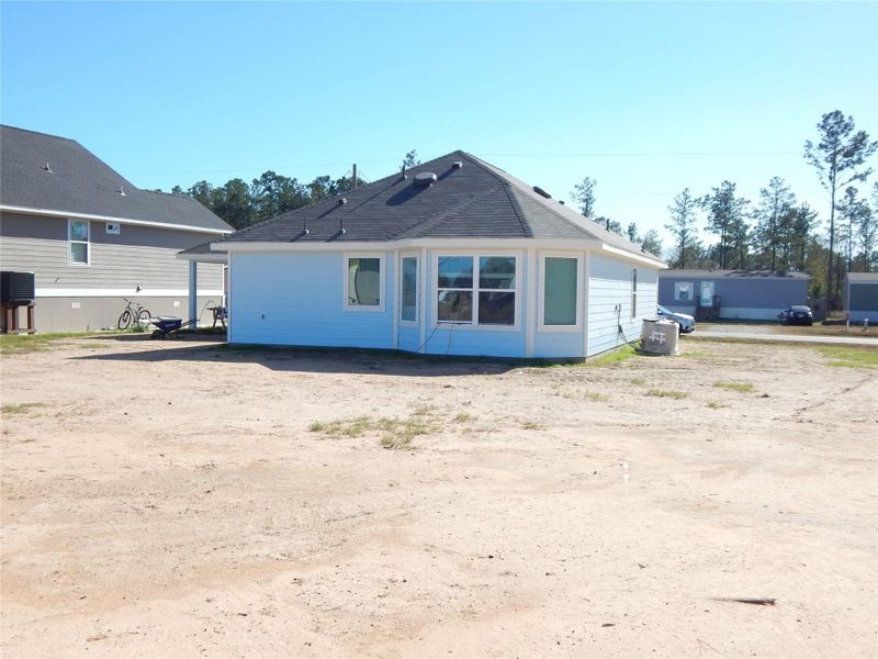 Exterior details and patio area of a home in , Conroe (Image 7).
