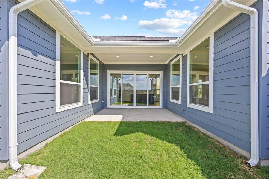 Exterior details and patio area of a home in The Heights at Uptown Celina, Celina (Image 1). Exterior details and patio area of a home in The Heights at Uptown Celina, Celina (Image 1).