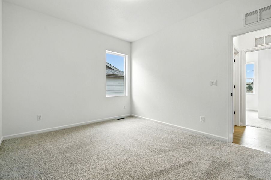 Spacious, unfurnished interior of a new home in Trailstone, Arvada (Image 16).