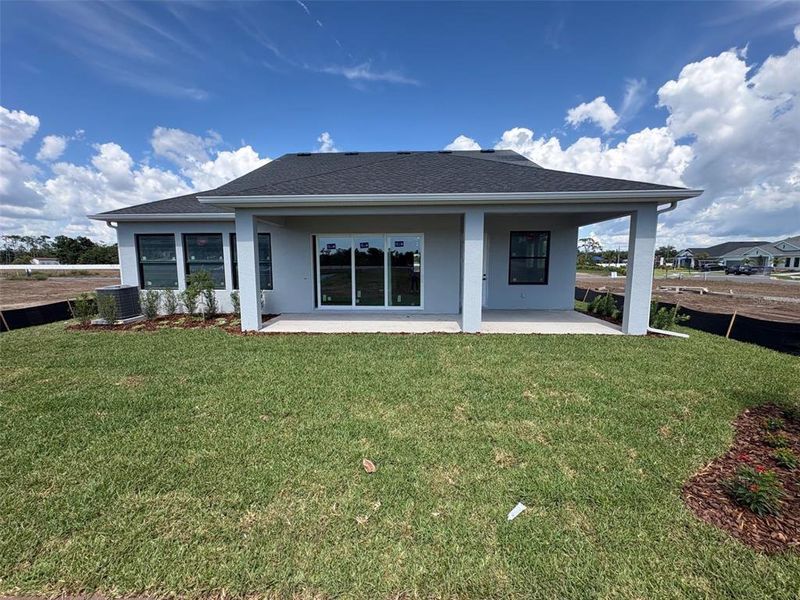 Exterior details and patio area of a home in Lakeview Crossing – Classic Series, Sarasota (Image 3).