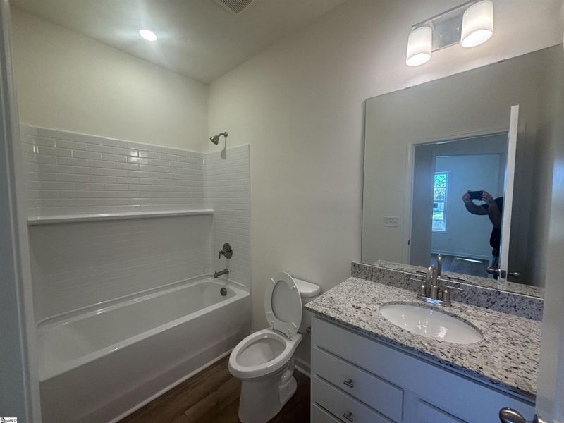 Furnished interior view inside a new home in Halton Oaks, Spartanburg (Image 1).