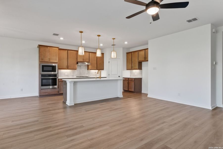 Furnished interior view inside a new home in Nopal Valley, San Antonio (Image 9).