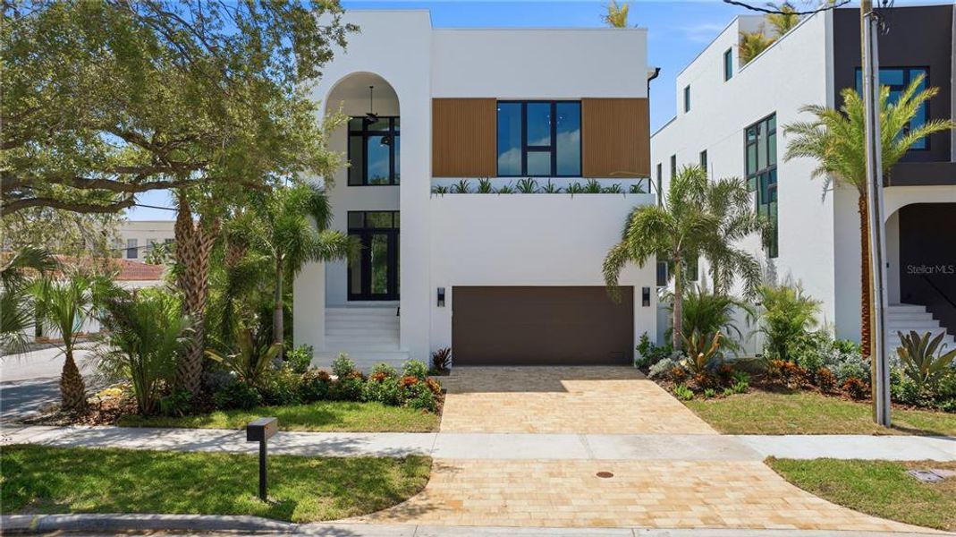 Front exterior of a new home in , Tampa, FL, highlighting curb appeal (Image 30). Front exterior of a new home in , Tampa, FL, highlighting curb appeal (Image 30).