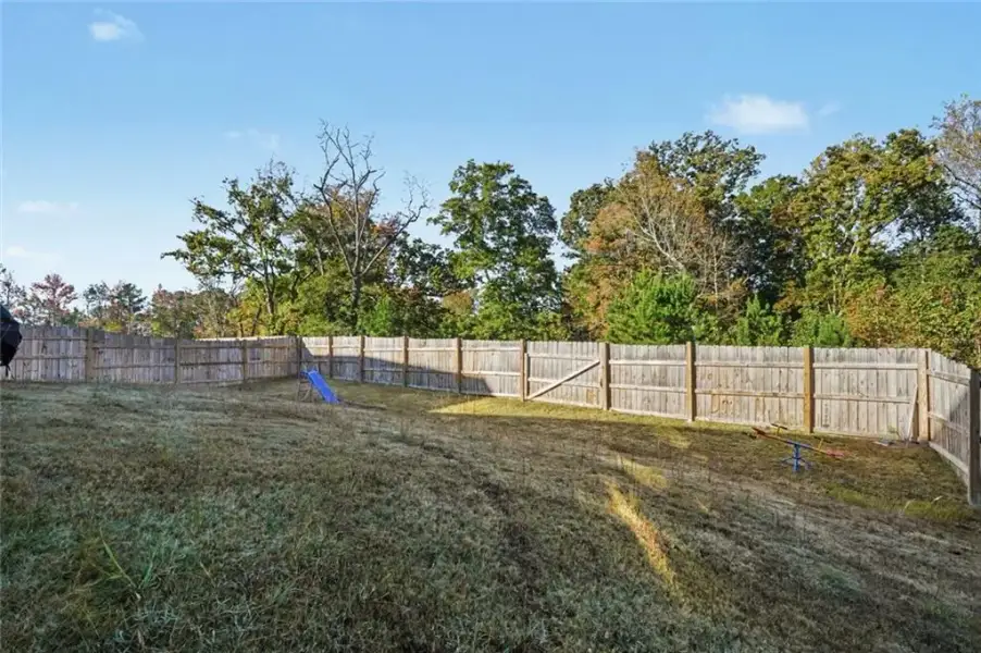 Exterior details and patio area of a home in Butner Estates, South Fulton (Image 26).