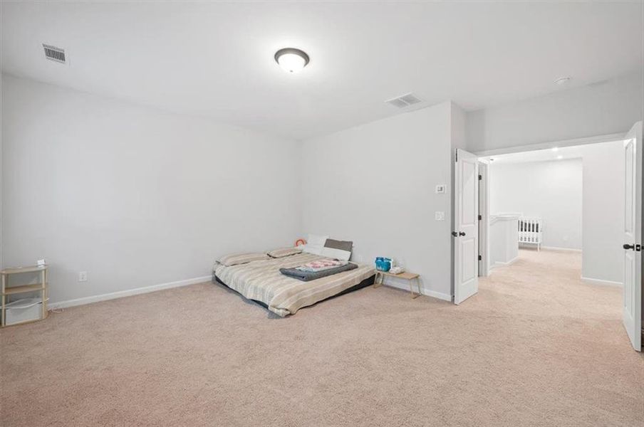 Furnished interior view inside a new home in Enclave at Edgewater, Holly Springs (Image 38).