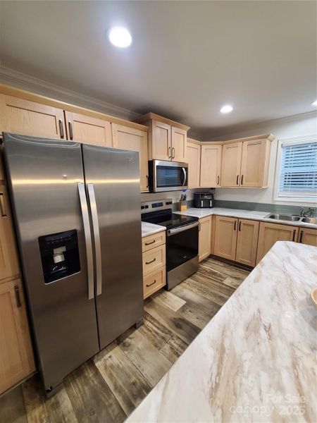 Furnished interior view inside a new home in , Olin (Image 21).