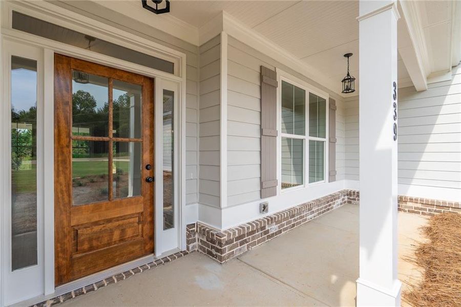 Exterior details and patio area of a home in , Social Circle (Image 3). Exterior details and patio area of a home in , Social Circle (Image 3).