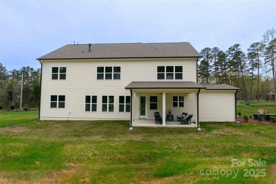 Front exterior of a new home in , Matthews, NC, highlighting curb appeal (Image 23). Front exterior of a new home in , Matthews, NC, highlighting curb appeal (Image 23).