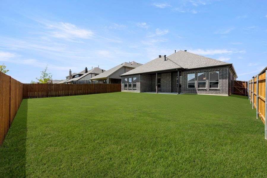 Exterior details and patio area of a home in Timberbrook, Justin (Image 20).