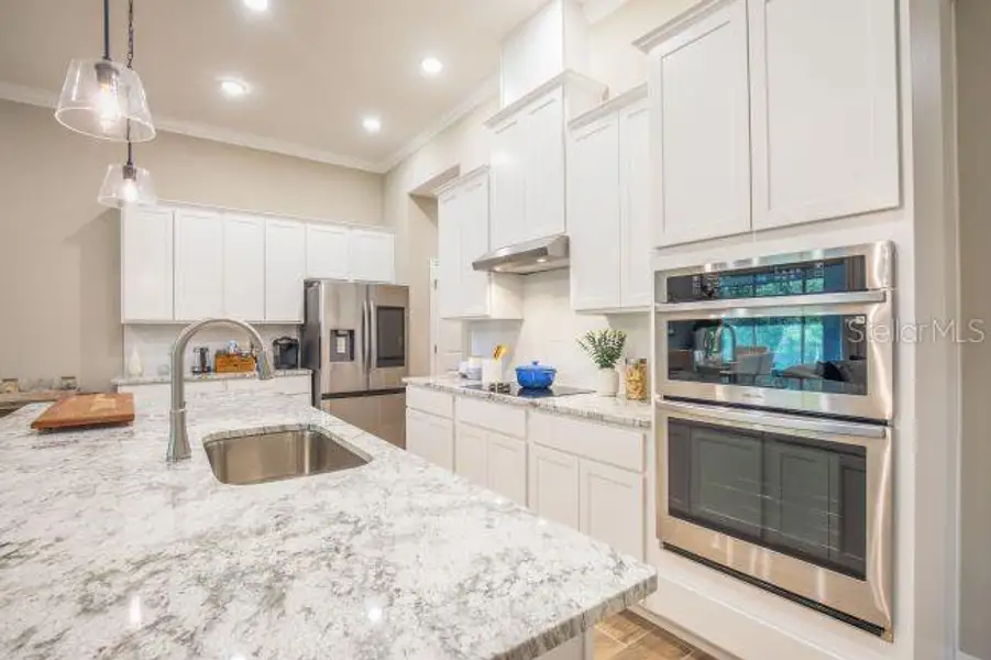Furnished interior view inside a new home in Royal Highlands, Weeki Wachee (Image 3).