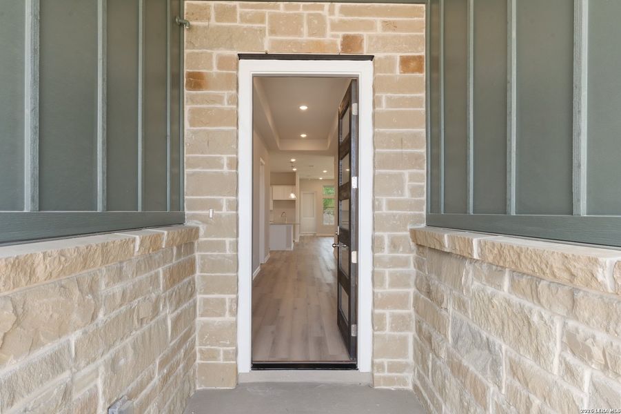 Exterior details and patio area of a home in The Crossvine, Schertz (Image 3).