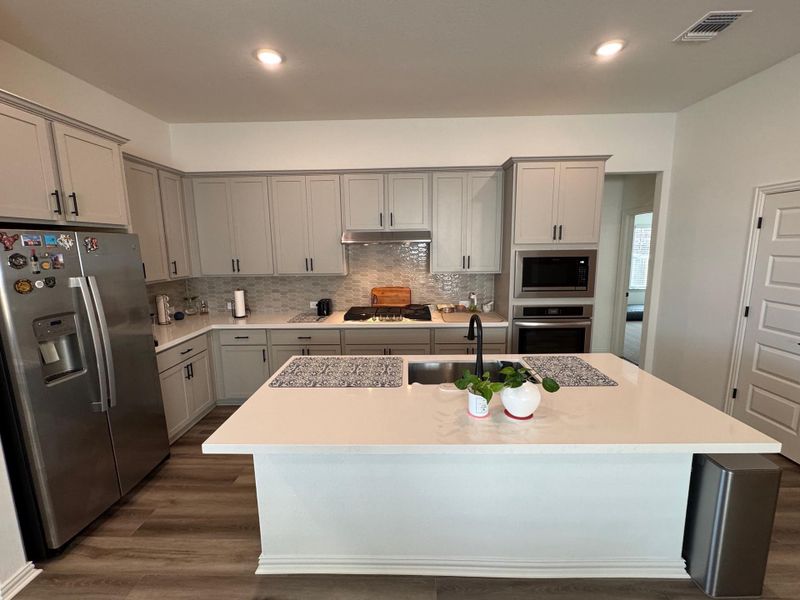 Furnished interior view inside a new home in Sunfield, Buda (Image 5).