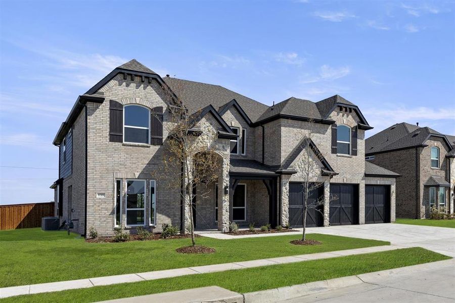 Front exterior of a new home in Polo Ridge, Mesquite, TX, highlighting curb appeal (Image 1).