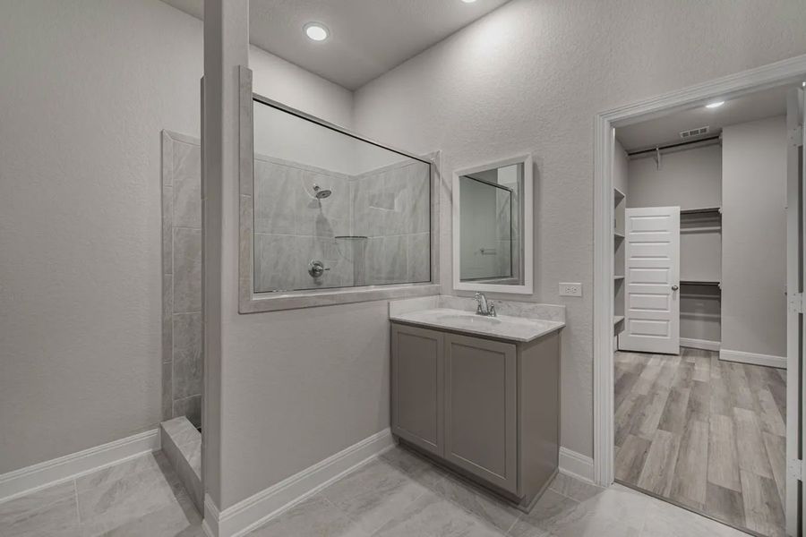 Representative furnished interior of a home built from the Shelby by Chesmar Homes in Buffalo Crossing, Cibolo (Image 16).