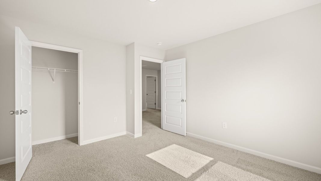 Spacious, unfurnished interior of a new home in The Reserve at Calcutta, Stockbridge (Image 21).
