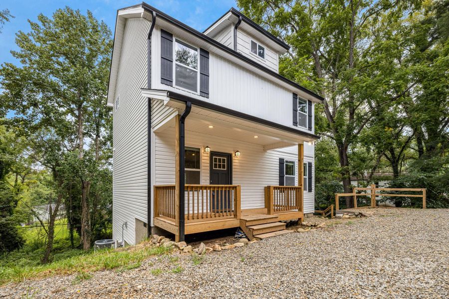 Front exterior of a new home in , Asheville, NC, highlighting curb appeal (Image 28).