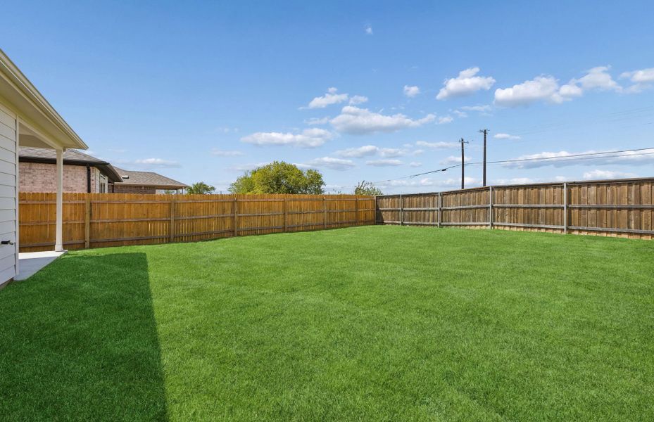 Exterior details and patio area of a home in Crosswinds, Kyle (Image 4).
