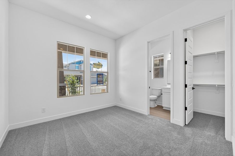Spacious, unfurnished interior of a new home in Ellsworth Ranch, Queen Creek (Image 24).