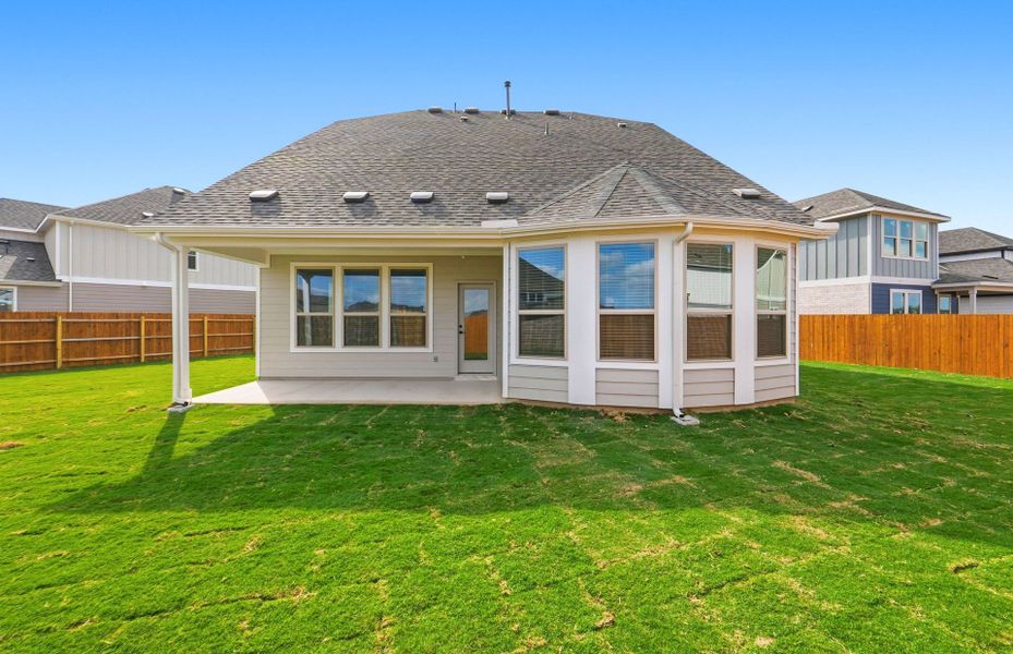 Exterior details and patio area of a home in Santa Rita Ranch, Liberty Hill (Image 31).