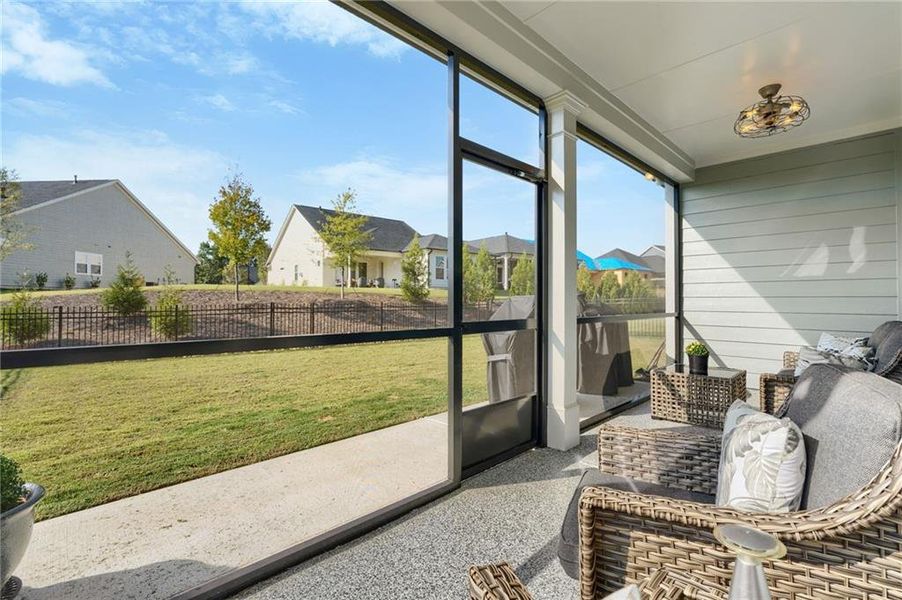 Exterior details and patio area of a home in Crescent Pointe at Great Sky, Canton (Image 28).