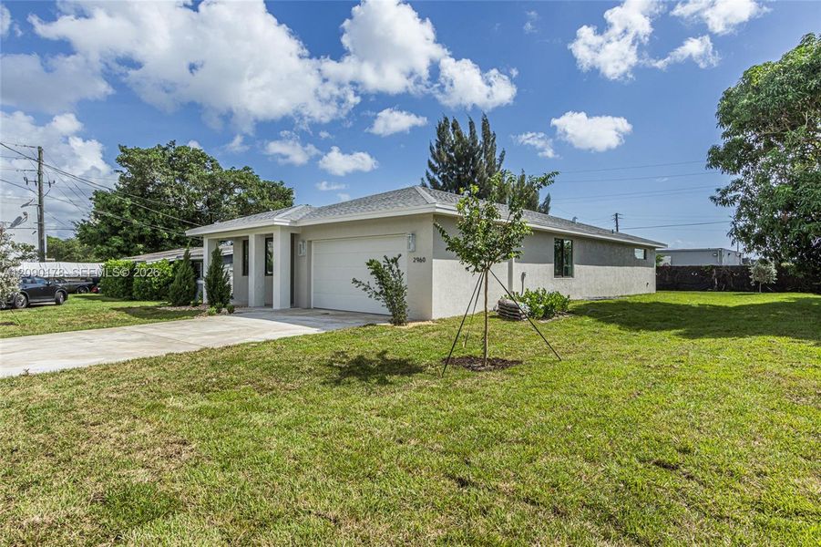 Front exterior of a new home in , Oakland Park, FL, highlighting curb appeal (Image 19).