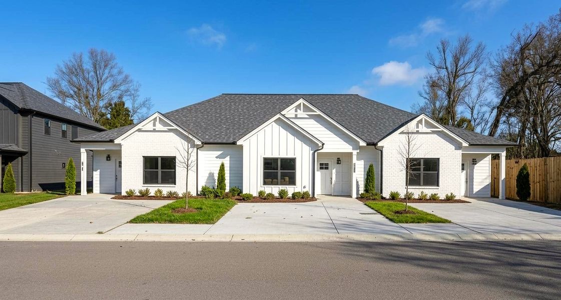 Front exterior of a new home in The Nassau, Chattanooga, TN, highlighting curb appeal (Image 1). Front exterior of a new home in The Nassau, Chattanooga, TN, highlighting curb appeal (Image 1).