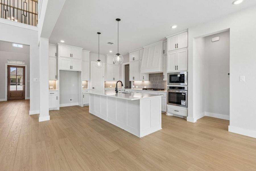 Furnished interior view inside a new home in Rainwater Crossing, Celina (Image 8).