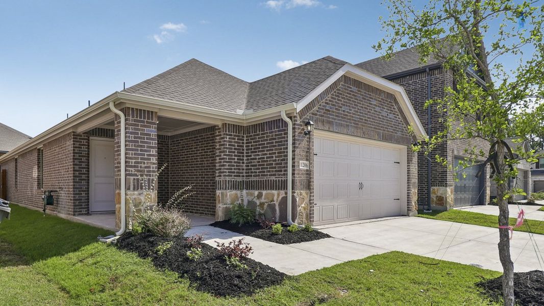 Representative exterior photo of a completed home built from the Orion by D.R. Horton in Winchester Crossing, Princeton, TX (Image 11).