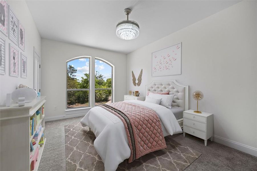 Carpeted bedroom with an inviting chandelier