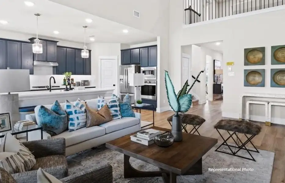 Picture cozy gatherings in a living area that encourages laughter, while the sleek kitchen—equipped with state-of-the-art appliances—beckons culinary adventures and family dinners.